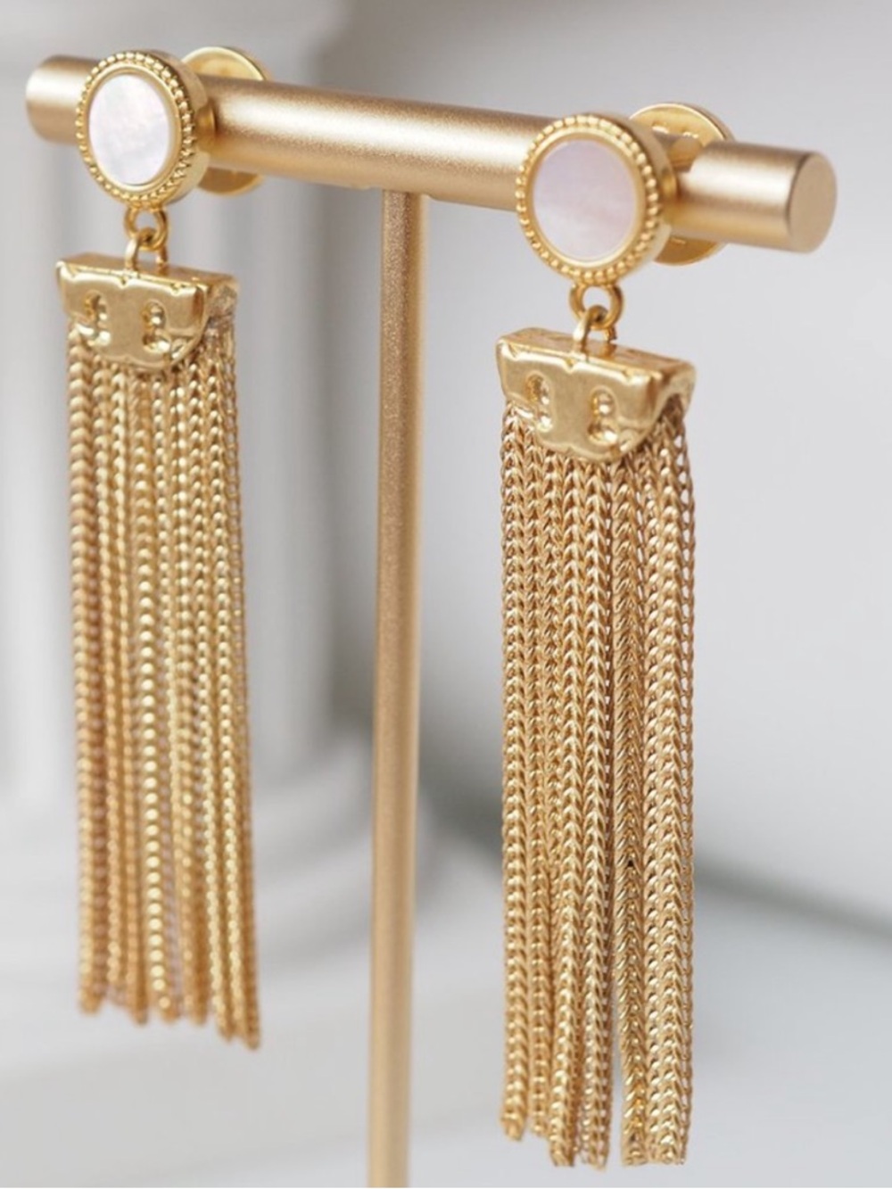 95: Tory Burch drop earrings